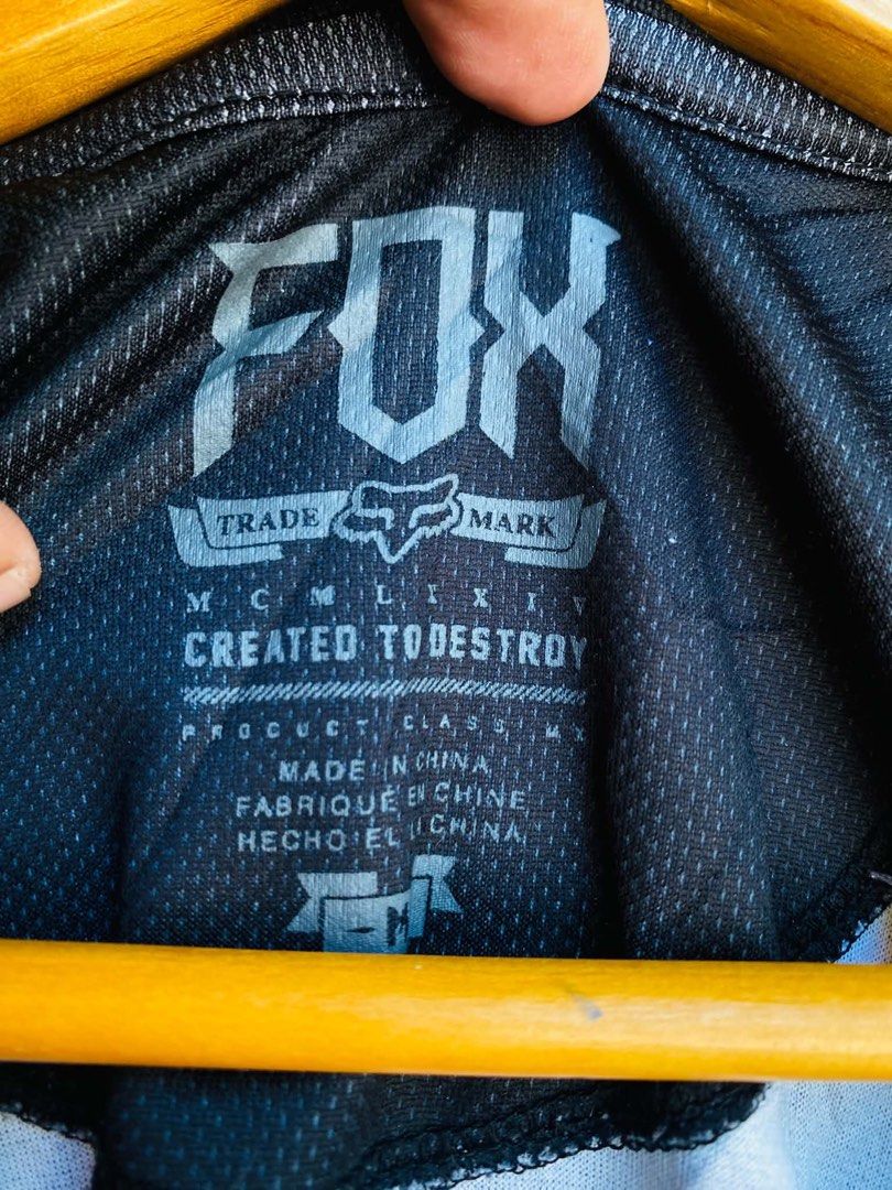 Fox Racing Motocross Jersey Tank Top (Category: Activewear) located in Digos. Submitted by thrifthed.ph (Listing ID 1461320187, Image 3). Description: - Brand: Fox Racing - Style: Sleeveless motocross jersey / tank top -med T L -like new -dimes:20.5.28 -no issue -authentic -complete tags -need wash -suitable for picky buyer -solid condi -solid colorate -cl:10/10 -no issue -no return no exchange - Colors: Black, white, and orange - Features: Iconi