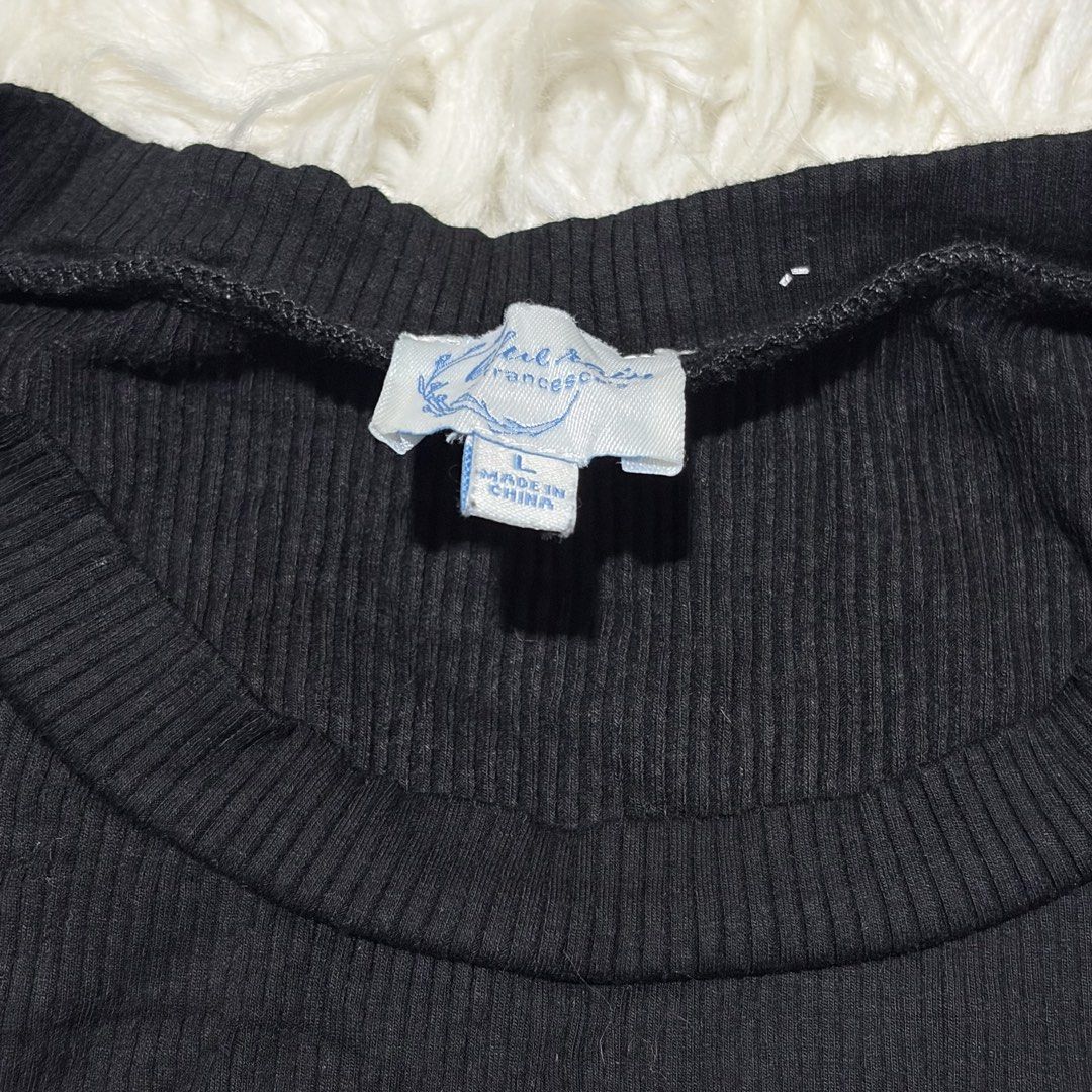 Francesca's Black Ribbed Flutter Sleeve Top Size L (Category: Blouses) located in Davao. Submitted by elizzadiac (Listing ID 1461229525, Image 3). Description: - Black ribbed top from Francesca's - Features cute flutter sleeves - Made from a comfortable viscose blend - Size: Large (L) - Perfect for dressing up or down.