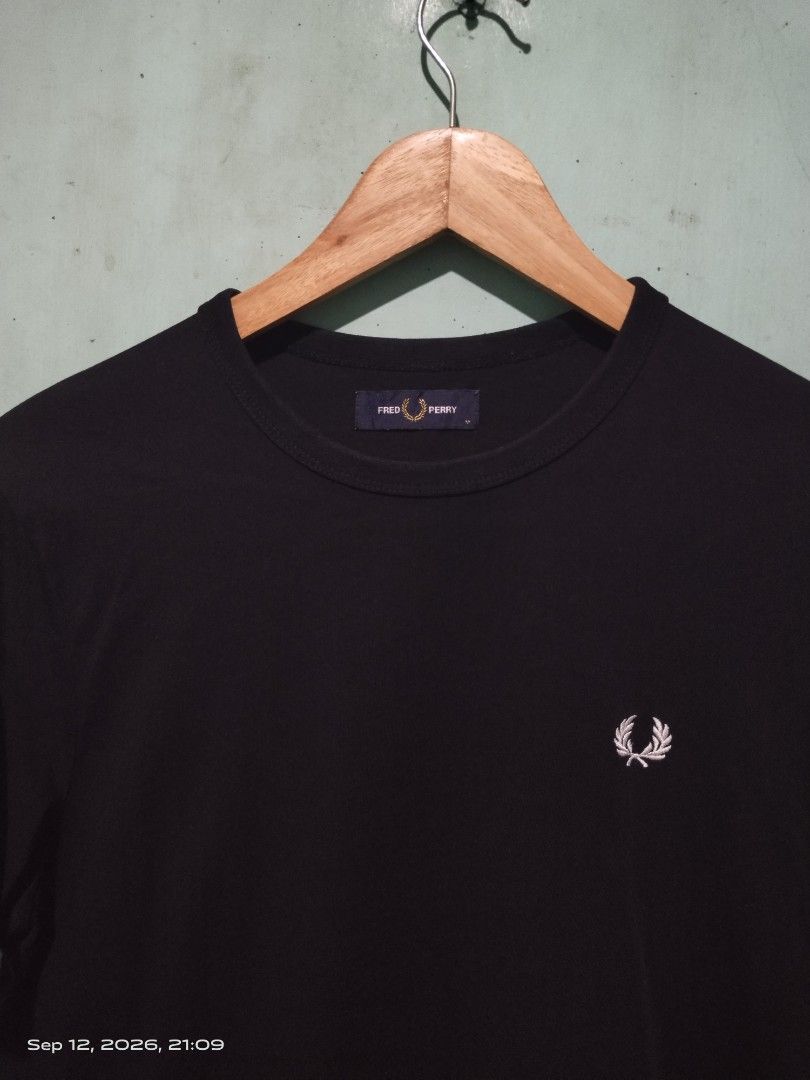 FRED PERRY RINGER SHORT SLEEVE BLACK SHIRT (Category: Tshirts & Polo Shirts ) located in Iloilo. Submitted by sydline20 (Listing ID 1461281001, Image 3). Description: DIMENSIONS: 22X28 CR/COND: 9. 5/10 or better EXCELLENT CONDITION ISSUE: ❌❌❌ PLS NOTE: ALL ITEMS ARE THRIFTED SOME OF THEM NEEDS WASH PLS MANAGE YOUR EXPECTATIONS COLOR MAY VARY DUE TO LIGHTING WHEN CAPTURED ON CAM. MODE OF PAYMENT: GCASH/GOTYME NO COD❌❌ ILOILO CITY LOCATION.