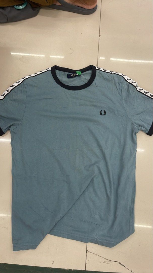 FRED PERRY TAPED ARM TAPED LOGO (Category: Tshirts & Polo Shirts ) located in Manila. Submitted by 5kcollectiveph (Listing ID 1461239186, Image 2). Description: FRED PERRY TAPED ARM LOGO -Large -Width: 22 -Length: 28 -Like new / Excellent condi.
