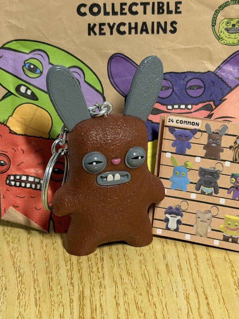 Fuggler Keychains - Series 1 & 2 (Category: Character Goods) located in Manila. Submitted by declutterbug__ (Listing ID 1461254410, Image 2). Description: 200 each 2 for 380 3 for 550 Take all 5 for 900 Prices are negotiable FOR SETS Inclusions: Pouch & brochure (Series 2) Pouch only (Series 1) Loc: Tondo, Manila MOD: J&T, Lalamove.