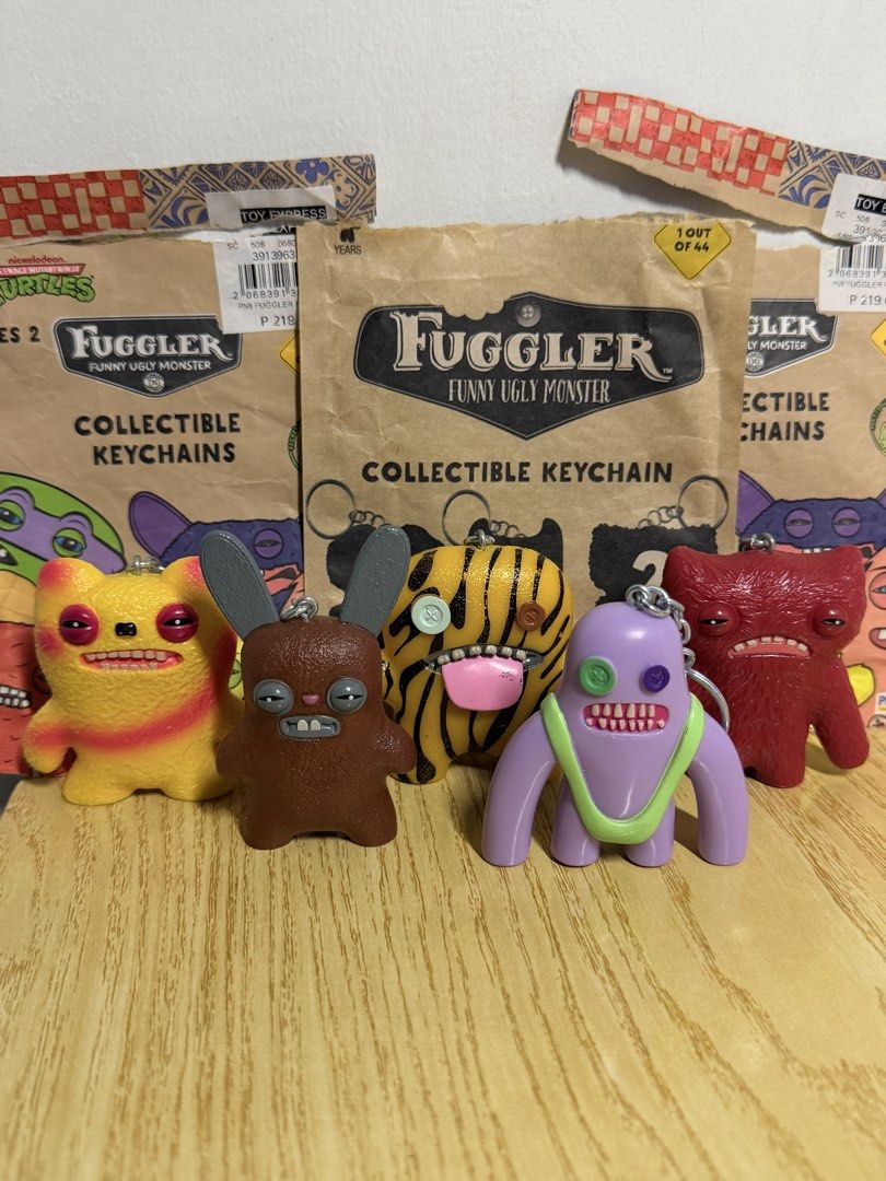 Fuggler Keychains - Series 1 & 2 (Category: Character Goods) located in Manila. Submitted by declutterbug__ (Listing ID 1461254410, Image 1). Description: 200 each 2 for 380 3 for 550 Take all 5 for 900 Prices are negotiable FOR SETS Inclusions: Pouch & brochure (Series 2) Pouch only (Series 1) Loc: Tondo, Manila MOD: J&T, Lalamove.