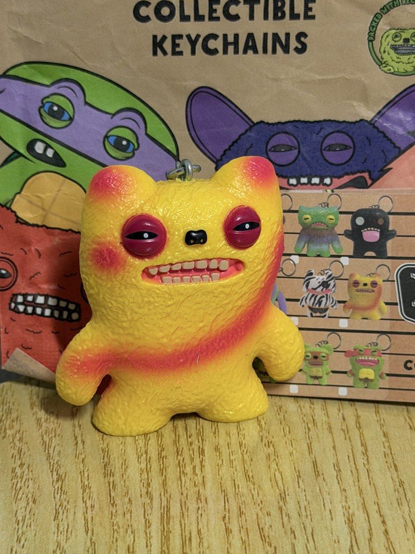 Fuggler Keychains - Series 1 & 2 (Category: Character Goods) located in Manila. Submitted by declutterbug__ (Listing ID 1461254410, Image 3). Description: 200 each 2 for 380 3 for 550 Take all 5 for 900 Prices are negotiable FOR SETS Inclusions: Pouch & brochure (Series 2) Pouch only (Series 1) Loc: Tondo, Manila MOD: J&T, Lalamove.