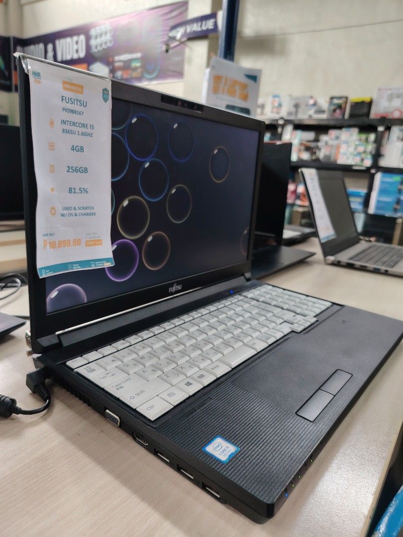 Fujitsu Laptop Intercore i5 w/o OS (Category: Laptops & Notebooks) located in Manila. Submitted by rollysuela09206 (Listing ID 1461140096, Image 3). Description: - Used Fujitsu Laptop - Intel Core i5 Processor @ 1.60GHz - 4GB RAM - 256GB Storage - 81.5% Screen Brightness - Includes Laptop and Charger - Price: P10,899.00.