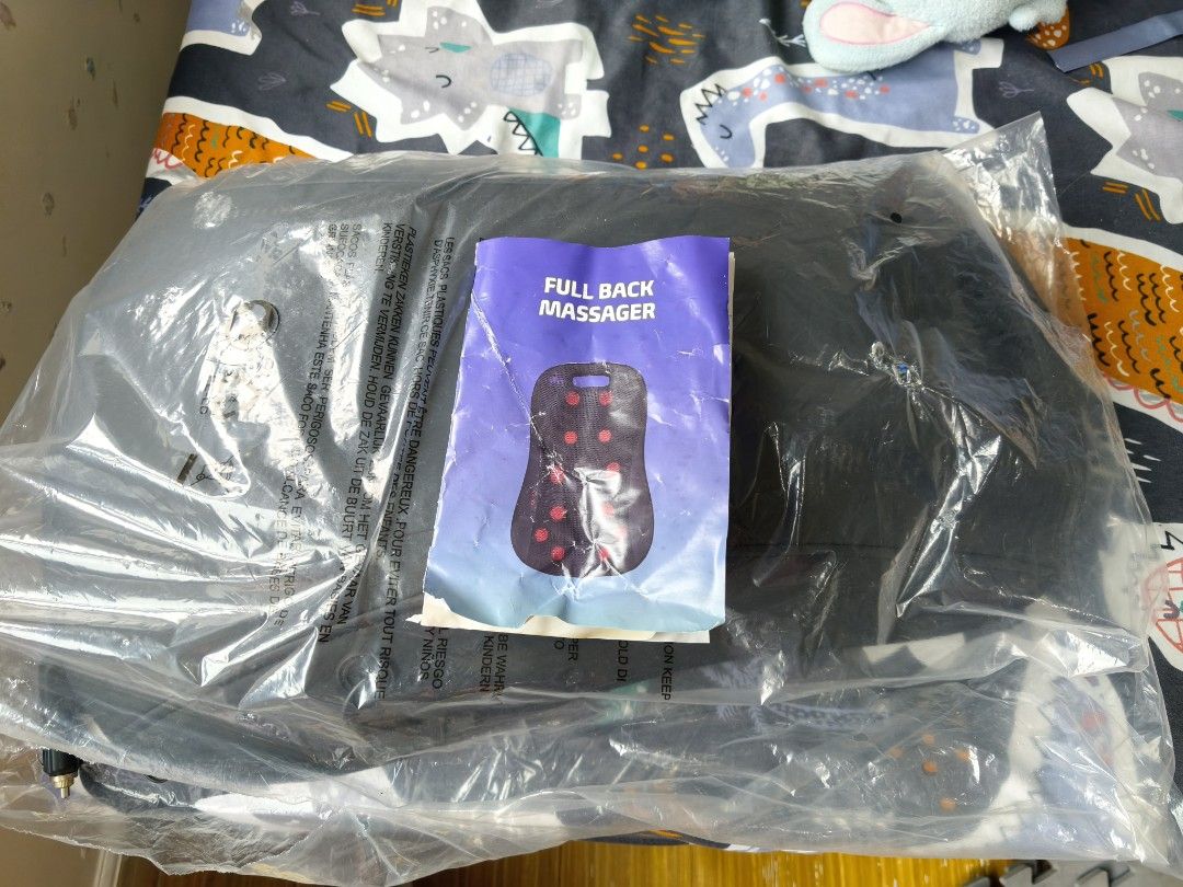 Full Back Massager (Category: Body Care) located in Manila. Submitted by juvy.alpha (Listing ID 1461118080, Image 2). Description: With a box but the box is in distorted condition..