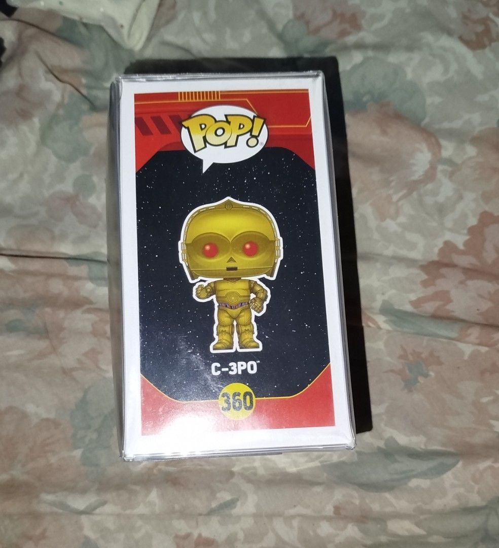 Funko Pop Star Wars C-3PO #360 (Category: Designer & Blind Box Toys) located in Quezon City. Submitted by y2k_thriftkid (Listing ID 1461225627, Image 2). Description: - Funko Pop! Star Wars #360: C-3PO - Iconic gold droid with striking red eyes - Comes in its original, well-maintained box - A must-have for any Star Wars enthusiast or Funko collector - Box condition: Good.