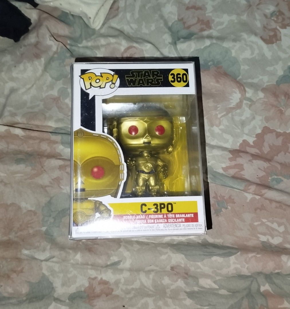 Funko Pop Star Wars C-3PO #360 (Category: Designer & Blind Box Toys) located in Quezon City. Submitted by y2k_thriftkid (Listing ID 1461225627, Image 1). Description: - Funko Pop! Star Wars #360: C-3PO - Iconic gold droid with striking red eyes - Comes in its original, well-maintained box - A must-have for any Star Wars enthusiast or Funko collector - Box condition: Good.