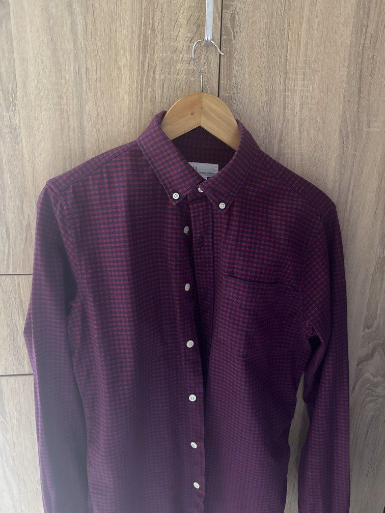 GAP Men's Red and Navy Gingham Button-Down Shirt (Category: Tshirts & Polo Shirts ) located in Mandaluyong City. Submitted by raykin (Listing ID 1461191415, Image 1). Description: - Classic red and navy gingham pattern - Brand: GAP - Style: Button-down collar - Features: Single chest pocket, long sleeves - Versatile: Ideal for casual or smart-casual outfits - Easy Pairing: Looks great with jeans or chinos.