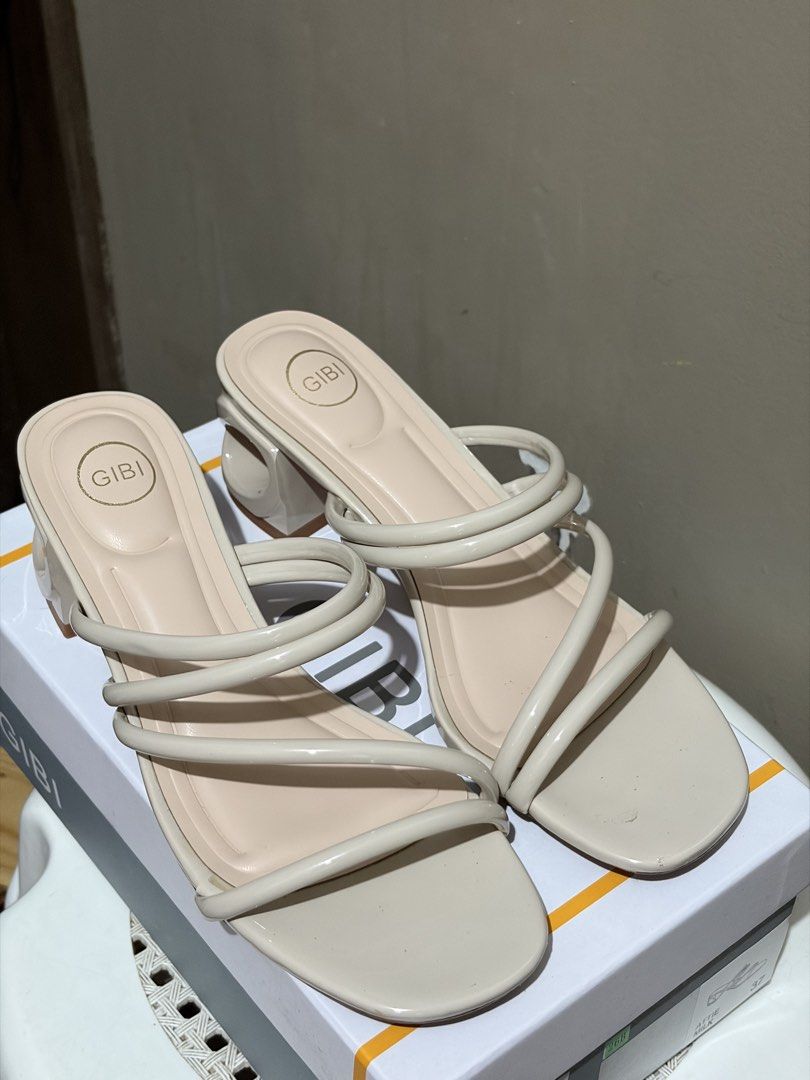 GIBI Beige Strappy Block Heel Sandals (Category: Heels) located in Muntinlupa City. Submitted by jrgnc (Listing ID 1461243017, Image 2). Description: - Brand: GIBI - Color: Beige - Style: Strappy sandals - Heel Type: Unique block heel - Closure: Easy slip-on - Versatility: Perfect for dressing up or down - Condition: Comes with original box - Used once only.