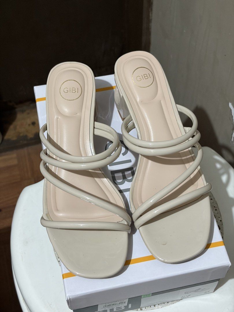 GIBI Beige Strappy Block Heel Sandals (Category: Heels) located in Muntinlupa City. Submitted by jrgnc (Listing ID 1461243017, Image 1). Description: - Brand: GIBI - Color: Beige - Style: Strappy sandals - Heel Type: Unique block heel - Closure: Easy slip-on - Versatility: Perfect for dressing up or down - Condition: Comes with original box - Used once only.