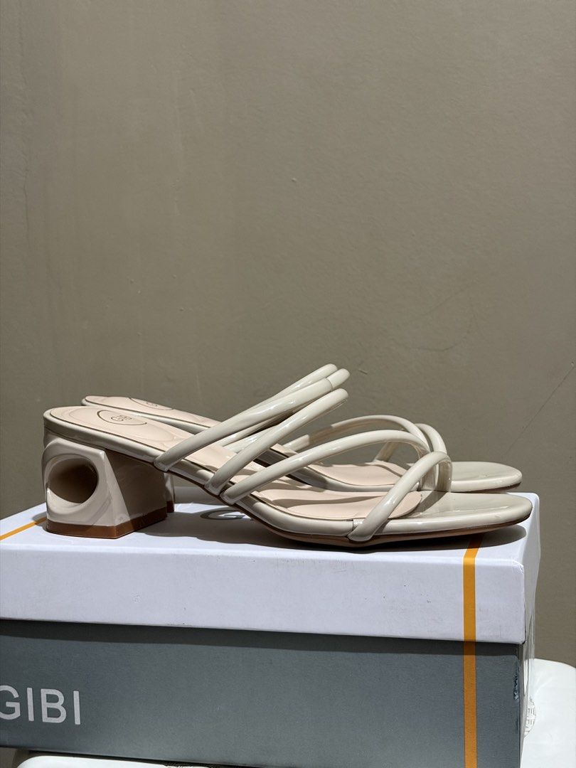 GIBI Beige Strappy Block Heel Sandals (Category: Heels) located in Muntinlupa City. Submitted by jrgnc (Listing ID 1461243017, Image 3). Description: - Brand: GIBI - Color: Beige - Style: Strappy sandals - Heel Type: Unique block heel - Closure: Easy slip-on - Versatility: Perfect for dressing up or down - Condition: Comes with original box - Used once only.