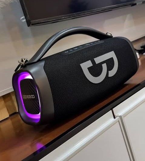 GOOJODOQ AB4092 Portable Bluetooth Speaker with Microphone (Category: Soundbars, Speakers & Amplifiers) located in Santa Rosa. Submitted by keendeer.6c83cc (Listing ID 1461178189, Image 2). Description: - Portable Bluetooth speaker with handle - Includes microphone for karaoke - Features colorful LED lights on the front - Wireless connectivity for easy setup - Ideal for parties and gatherings - Easy to carry around - Original box included.