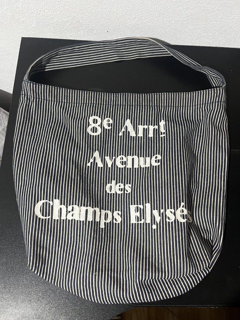 Graphic Striped tote bag y2k office (Category: Shoulder Bags) located in Tuguegarao City. Submitted by wear.lyunji (Listing ID 1461124683, Image 1). Description: spacious snap button has one compartment.