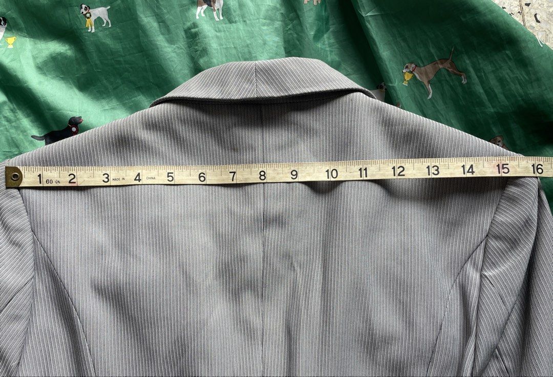 Gray pinstripe blazer (Category: Others Tops) located in Quezon City. Submitted by liama (Listing ID 1461122444, Image 3). Description: Tailoring gives nice silhouette Can go casual to dressy with light or dark top/ pants / skirt Lightweight, easy to maintain < 2-day reservation period; GCash; buyer books/pays for pick up : QC EDSA-GMA area, OR if u r in vicinity i cn jst hand it over to u>.