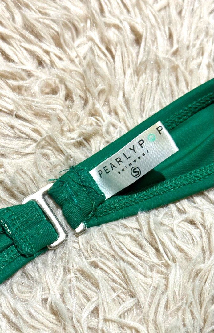Green Bandeau Bikini (Category: Bikinis & Swimsuits) located in Quezon City. Submitted by dearpretty.ph (Listing ID 1461289779, Image 2). Description: XS-Small size S on tag Hook closure High waisted Camera used: iPhone 15 Pro Max Colors may slightly vary due to lighting.