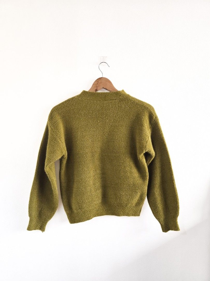 Green Knit Patch Sweater (Category: Coats, Jackets and Outerwear) located in San Juan City. Submitted by janda.slctns (Listing ID 1461267590, Image 2). Description: Color: Green with Beige Patch . Pattern: Solid Knit with Geometric Letter Motif Size: No tag (see dimensions for fit reference) ; medium frame Features: Beige rectangular patch with large white “M,” small knitted pocket detail, ribbed cuffs and hem, matching knit hat (set) Condition: 