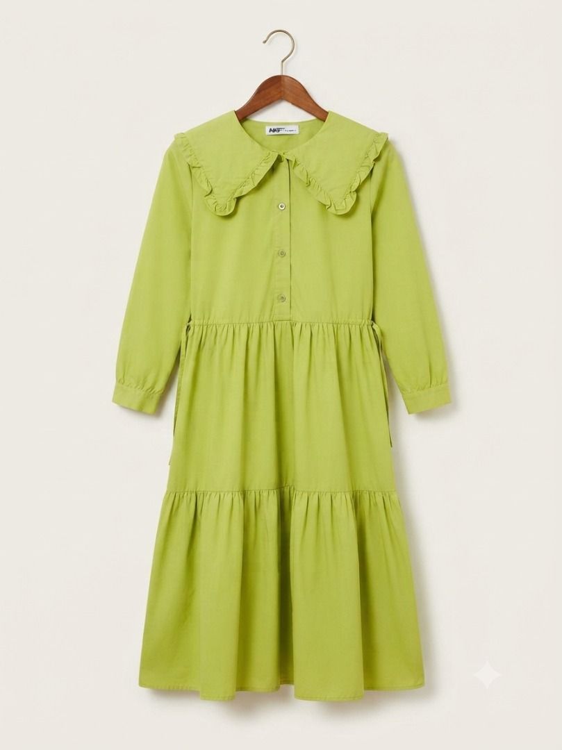 Green Tiered Mini Dress with Peter Pan Collar (Category: Dresses) located in Caloocan City. Submitted by truehawk_30384f (Listing ID 1461282296, Image 3). Description: - Adorable green tiered mini dress - Features a large Peter Pan collar with ruffled edges - Long sleeves - Button-up front - Two-tiered skirt - Versatile for casual outings or fun events.