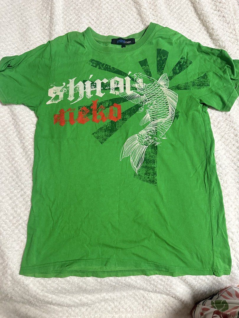 Green T-shirts with graphic prints bundle (Category: Shirts) located in Pasig City. Submitted by s4sayaki (Listing ID 1461174631, Image 2). Description: - Two green t-shirts for sale. - T-shirt 1: Features a 'Summer Wave' graphic with surfers and a sunset. - T-shirt 2: Features a koi fish graphic and 'shiratsuyu' text. - Both are short-sleeved. - Ideal for casual everyday wear..