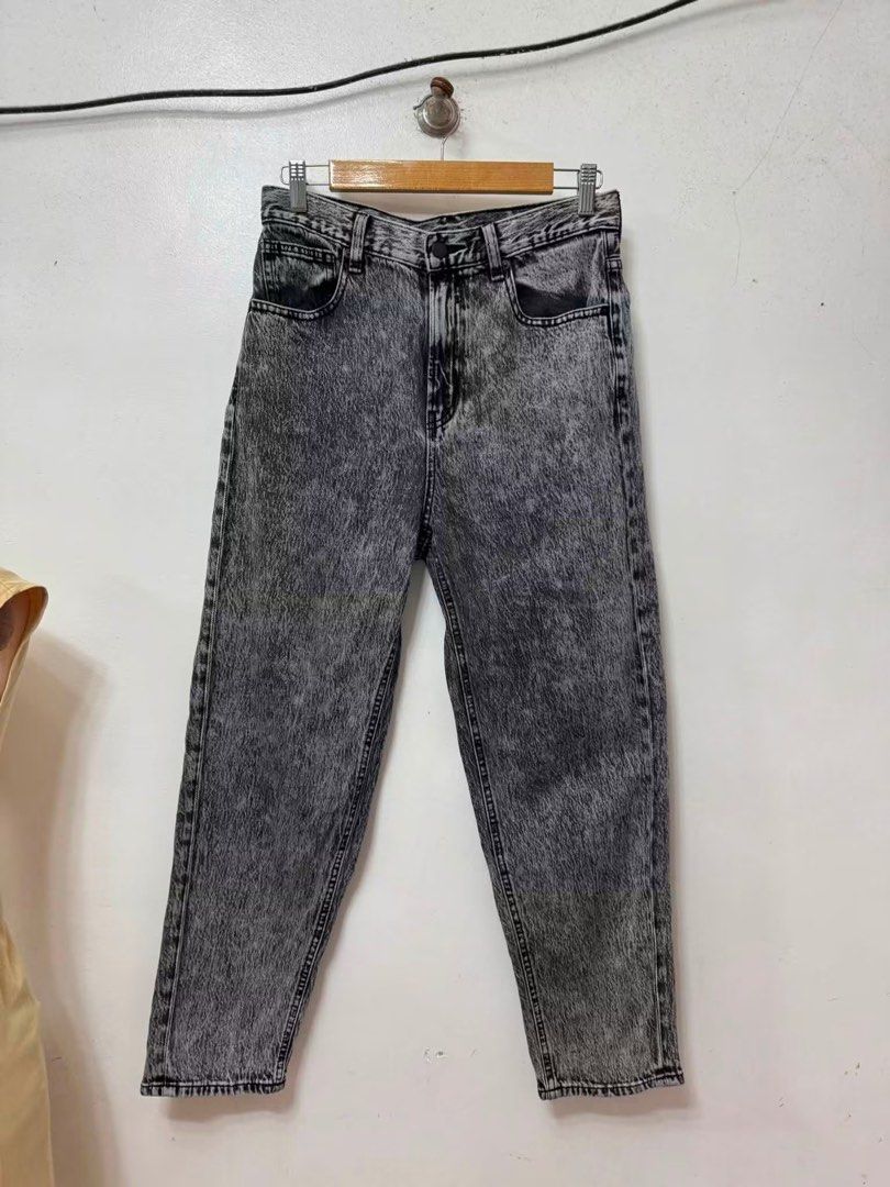 Grey Acid Wash Mom Jeans Size M (Category: Jeans) located in Cavite. Submitted by yakultjeni85475 (Listing ID 1461134564, Image 2). Description: - Grey acid wash mom jeans - High waisted fit - Straight leg cut - Button and zip closure - Pockets at front and back - Versatile for everyday wear.