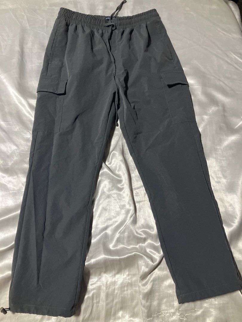 Grey Cargo Pants with Drawstring Waist (Category: Other Bottoms) located in Caloocan City. Submitted by ahavastuff.ph (Listing ID 1461324075, Image 1). Description: Comfy grey cargo pants with elastic waist, drawstring, and multiple pockets. Adjustable ankles. Perfect for daily casual wear. .