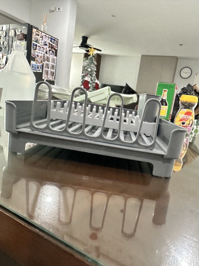 Grey Dish Rack for Kitchen Countertop (Category: Other Kitchenware & Tableware) located in Caloocan City. Submitted by kianoto (Listing ID 1461148393, Image 2). Description: - Grey dish rack - Holds plates, cups, and cutlery - Ideal for drying dishes - Organizes kitchen counters - Compact size fits most spaces - Easy to clean.