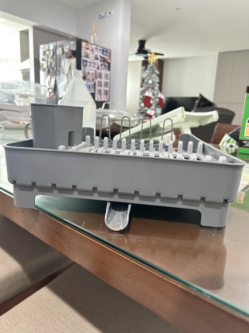 Grey Dish Rack for Kitchen Countertop (Category: Other Kitchenware & Tableware) located in Caloocan City. Submitted by kianoto (Listing ID 1461148393, Image 3). Description: - Grey dish rack - Holds plates, cups, and cutlery - Ideal for drying dishes - Organizes kitchen counters - Compact size fits most spaces - Easy to clean.