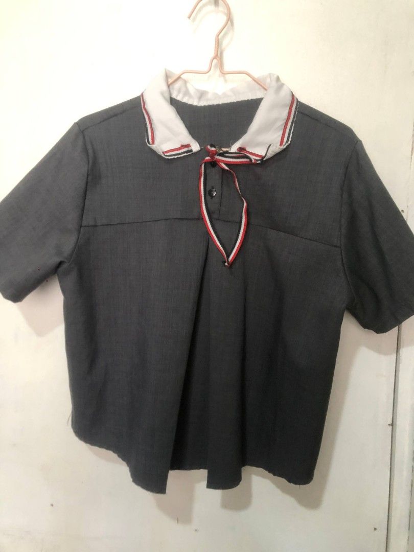 Grey Sailor Collar Top and Skort Set (Category: Sets or Coordinates) located in Mandaluyong City. Submitted by chloesy69 (Listing ID 1461121033, Image 1). Description: - Grey sailor collar top with red/white/blue trim - Short sleeves - Matching grey skort with layered front - Button closure on top - Ideal for school uniforms or themed outfits - Comfortable fit NOTE: payment first MOP: gcash/gotyme I NO COD.