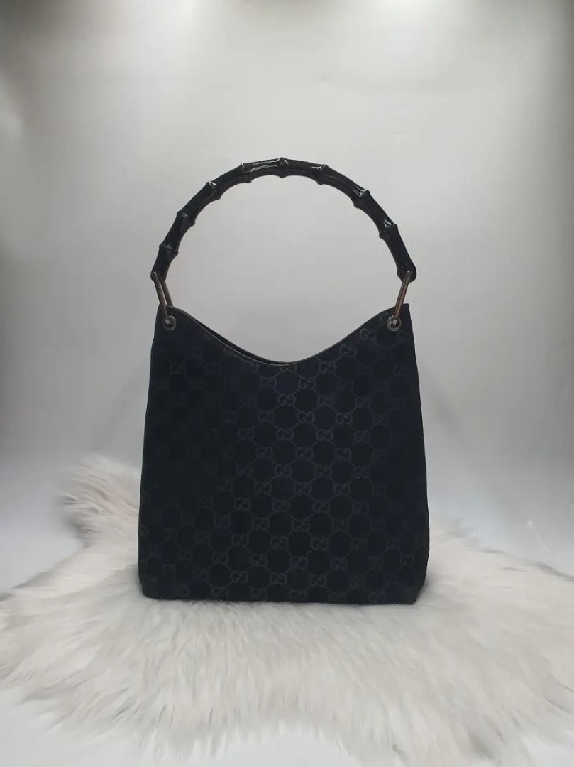 Gucci Monogram Suede Bamboo Black Shoulder Bag (Category: Activewear) located in Manila. Submitted by aftermarketphilippines (Listing ID 1461182685, Image 1). Description: Gucci Monogram Suede Bamboo Black Shoulder Bag 9.5/10 (Good As New) No issue Used Price : 18000.