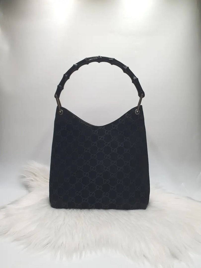 Gucci Monogram Suede Bamboo Black Shoulder Bag (Category: Activewear) located in Manila. Submitted by aftermarketphilippines (Listing ID 1461182685, Image 2). Description: Gucci Monogram Suede Bamboo Black Shoulder Bag 9.5/10 (Good As New) No issue Used Price : 18000.