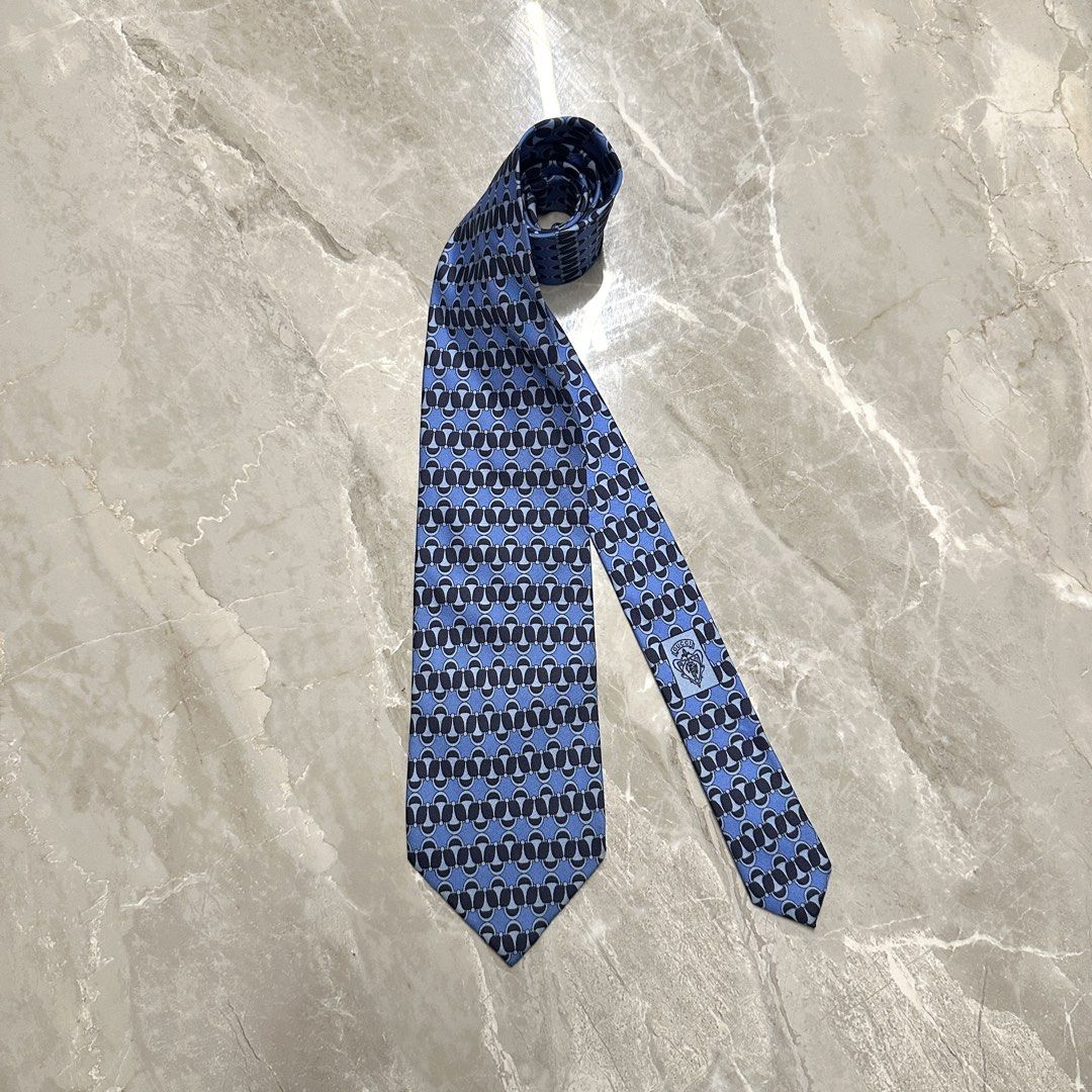GUCCI Vintage Blue Patterned Silk Neck Tie (Category: Ties) located in Lemery. Submitted by thesecond_row.ph (Listing ID 1461211309, Image 1). Description: GUCCI Vintage Blue Patterned Silk Neck Tie Authentic! Made in Italy No issue Best for formal suits! 👔.