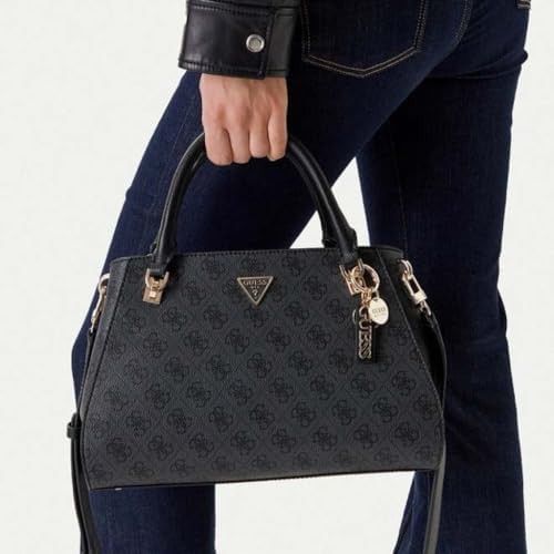 Guess Monogram Satchel Handbag with Strap (Category: Luxury Bags & Wallets) located in Navotas City. Submitted by ladyjansen (Listing ID 1461182992, Image 3). Description: - Classic Guess satchel bag - All-over monogram print - Detachable shoulder strap included - Elegant gold-tone hardware - Signature Guess logo charm - Multiple interior compartments for organization - Ideal everyday bag.