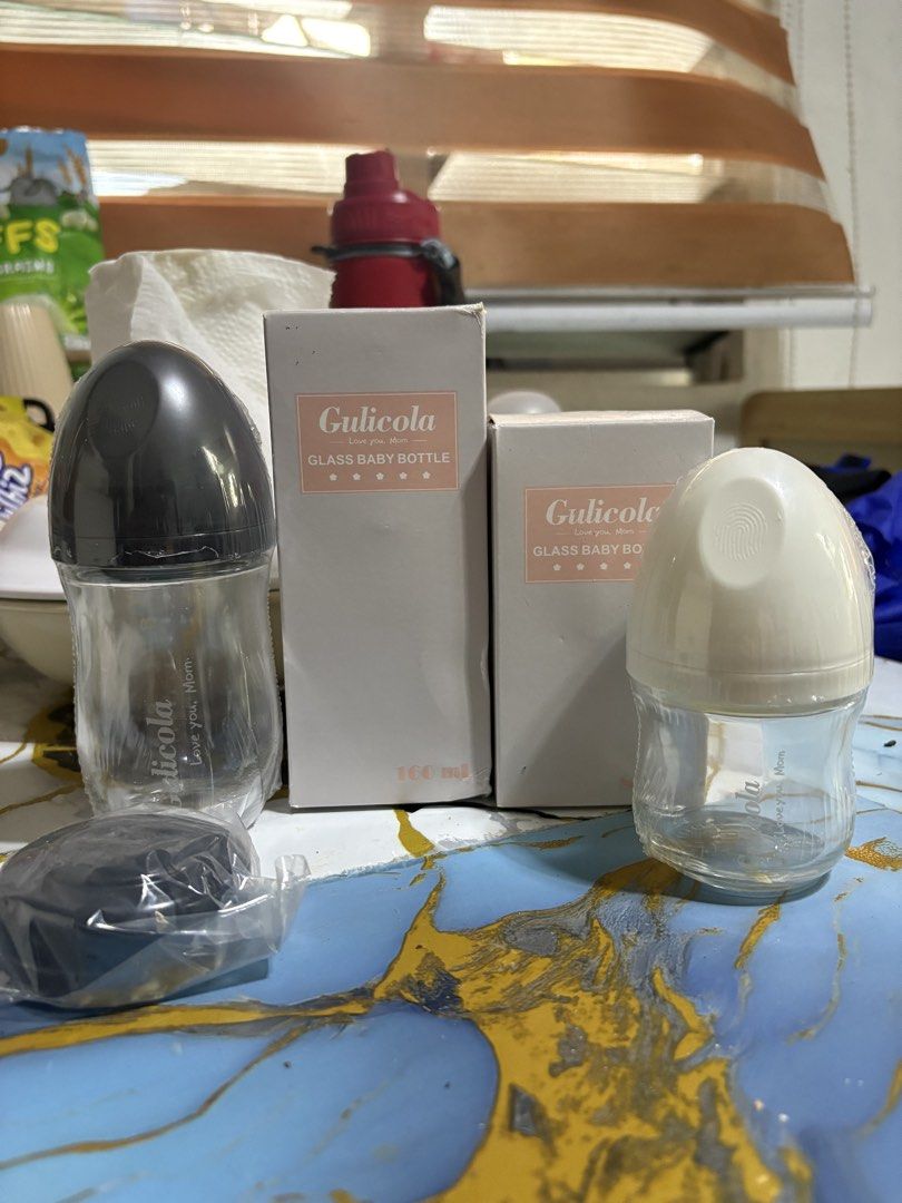 Gulicola 2pcs Glass bottle (Category: Breastfeeding & Bottle Feeding) located in Muntinlupa City. Submitted by _vntglxx (Listing ID 1461120002, Image 1). Description: See last photo for the og price. Sealed & brand new Lalamove & Jnt 📍Naic, Cavite.