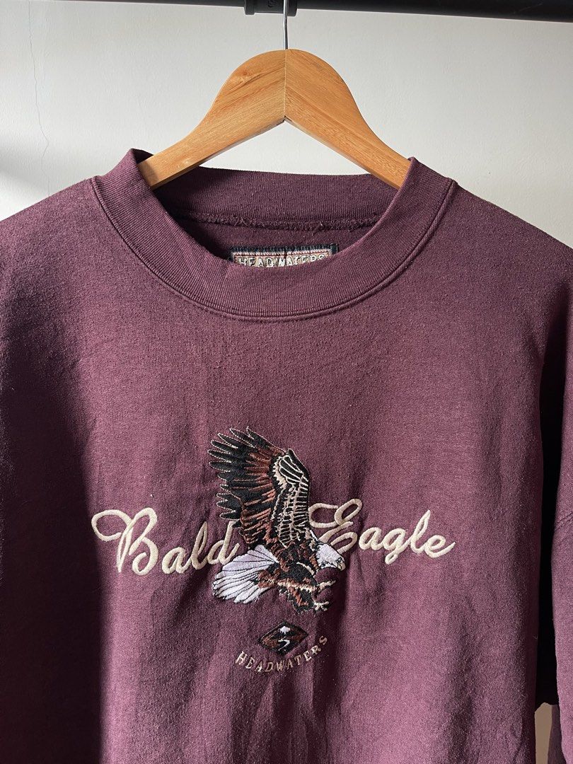 Headwaters Bald Eagle Embroidered Burgundy Sweatshirt (Category: Coats, Jackets and Outerwear) located in Tarlac. Submitted by supremo.0 (Listing ID 1461138475, Image 2). Description: - Vintage Headwaters Burgundy crewneck sweatshirt - Cool embroidered bald eagle graphic - Text: 'Bald Eagle' and 'Headwaters' - Long sleeves - Crew neck - Ideal for casual wear - Comfortable fit Issue: minimal lints.