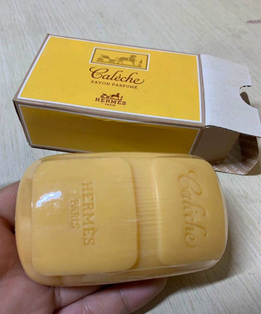 Hermes Caleche Savon Parfume Soap (Category: Bath) located in Alaminos. Submitted by sachiKaSan (Listing ID 1461252123, Image 1). Description: - Authentic Hermes Caleche Savon Parfume soap - Comes in original yellow Hermes box - Features "Hermes Paris" and "Caleche" imprints on the soap - Lovely, signature scent - Ideal for gifting or personal indulgence.