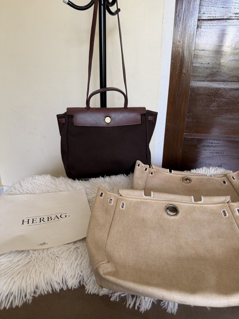 Hermes Herbag Brown Canvas Leather pm authentic (Category: Luxury Bags & Wallets) located in Manila. Submitted by sanmer25 (Listing ID 1461231739, Image 3). Description: - Authentic Hermes Herbag bag - Color: Brown canvas with leather trim and handles with 2 canvas bags more total of 3 interchangeable bag - Closure: Lock and key - Includes: Original dust bag and care booklet - Features: Spacious interior, classic design - Perfect for everyday use