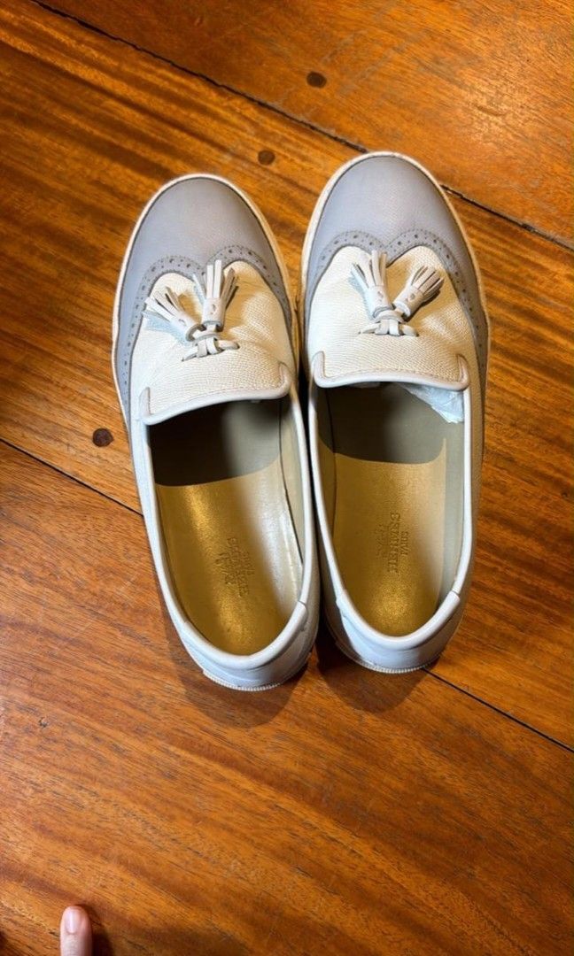 Hermes kick sneaker size 38 ladies (Category: Sneakers & Footwear) located in San Juan City. Submitted by dailydealsphest2010 (Listing ID 1461139420, Image 1). Description: ​Model: Hermès Kick (often cataloged as the Kick Slip-On or Kick Moccasin) ​Design Features: Slip-on silhouette combining canvas and leather, featuring a wingtip/brogue-detailed toe cap, dual leather tassels, and a white rubber sneaker sole. ​Outsole: Classic Hermès tread patt