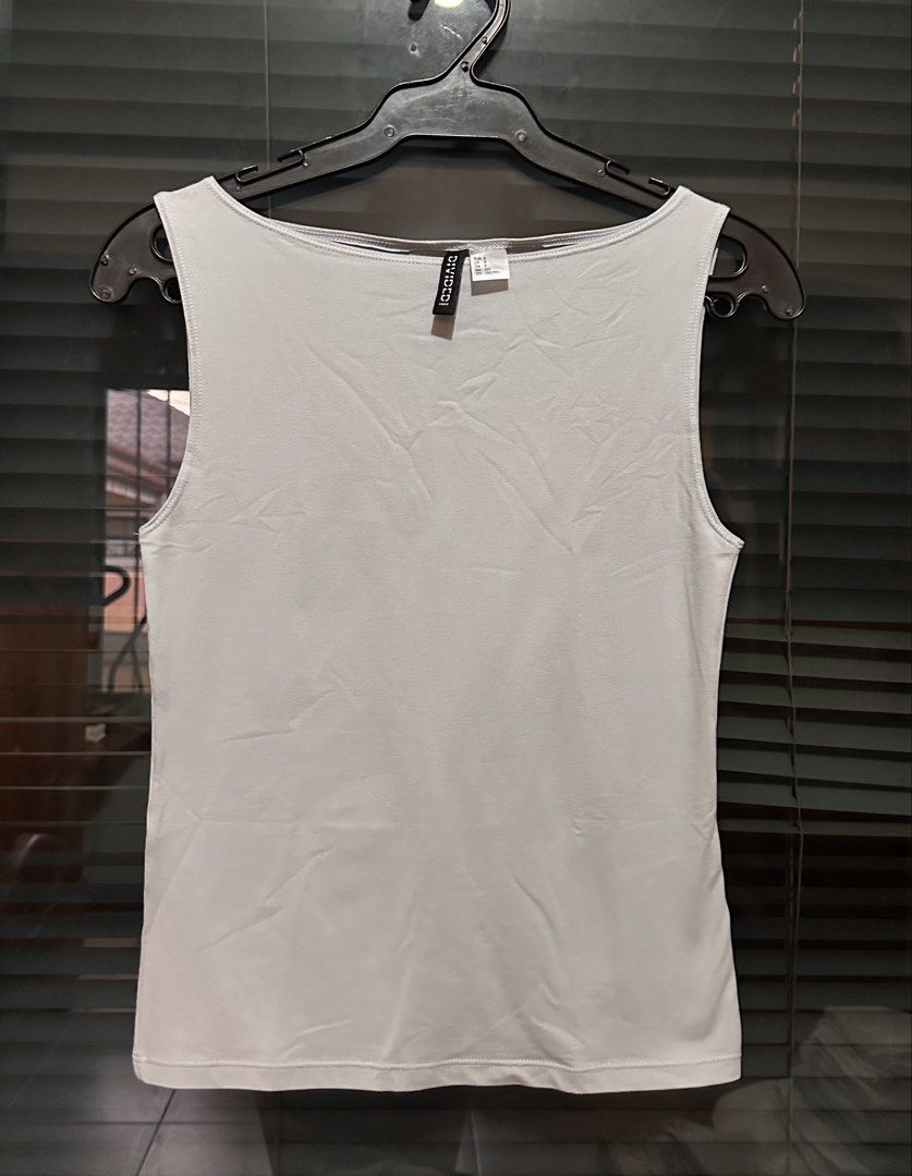 H&M boatneck top (Category: Sleeveless) located in Rizal. Submitted by _prelovedbycdc (Listing ID 1461245885, Image 1). Description: Used twice only In perfect condition Color: bluish gray.
