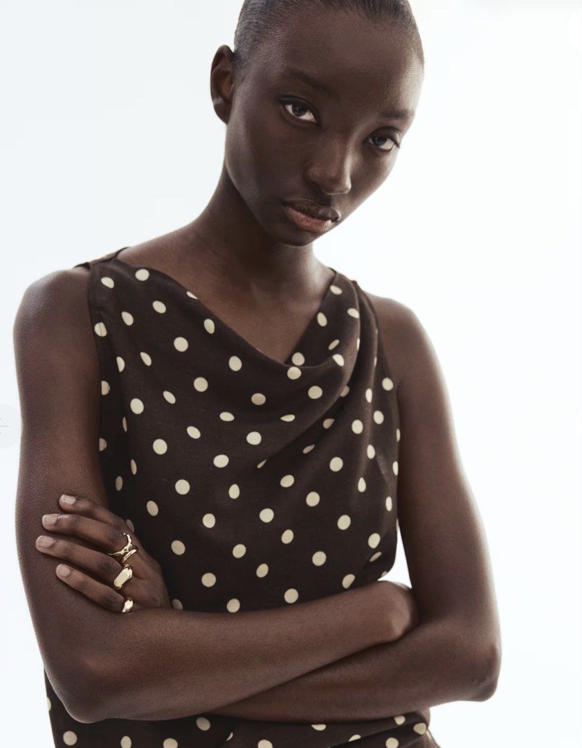 H&M Cowl Neck Linen blend top (Category: Blouses) located in Santa Rosa. Submitted by je_anj (Listing ID 1461124333, Image 1). Description: Brown Polka Dot Cowl Neck Sleeveless Top Details: Cowl/draped neckline Sleeveless design Lightweight, flowy fabric with a subtle woven texture Condition: Almost new (used once) Size: XS Width: 89 cm, Length: 52 cm.