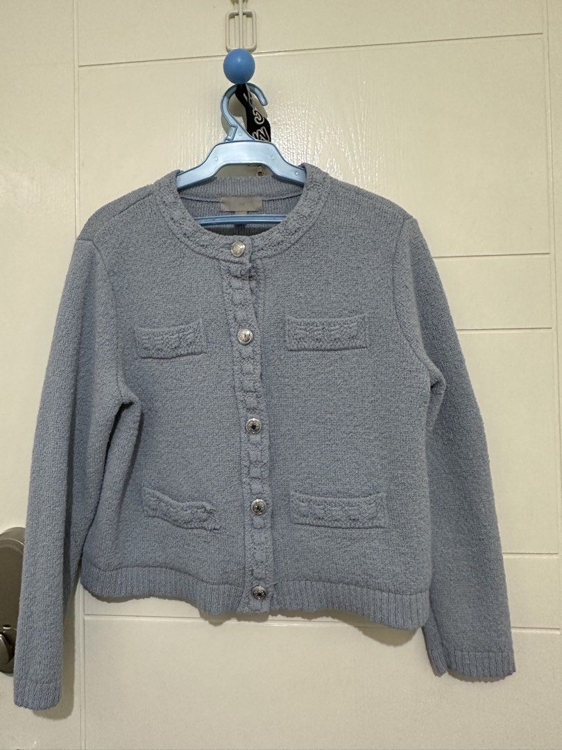 H&M Light Blue Textured Button-Up Cardigan (Category: Coats, Jackets and Outerwear) located in Manila. Submitted by itsyourgirlmc (Listing ID 1461287474, Image 1). Description: - Light blue textured cardigan from H&M - Round neckline - Silver button closures - Two faux pocket details - Cropped length - Ideal for layering over tops or dresses - Comfortable knit material.