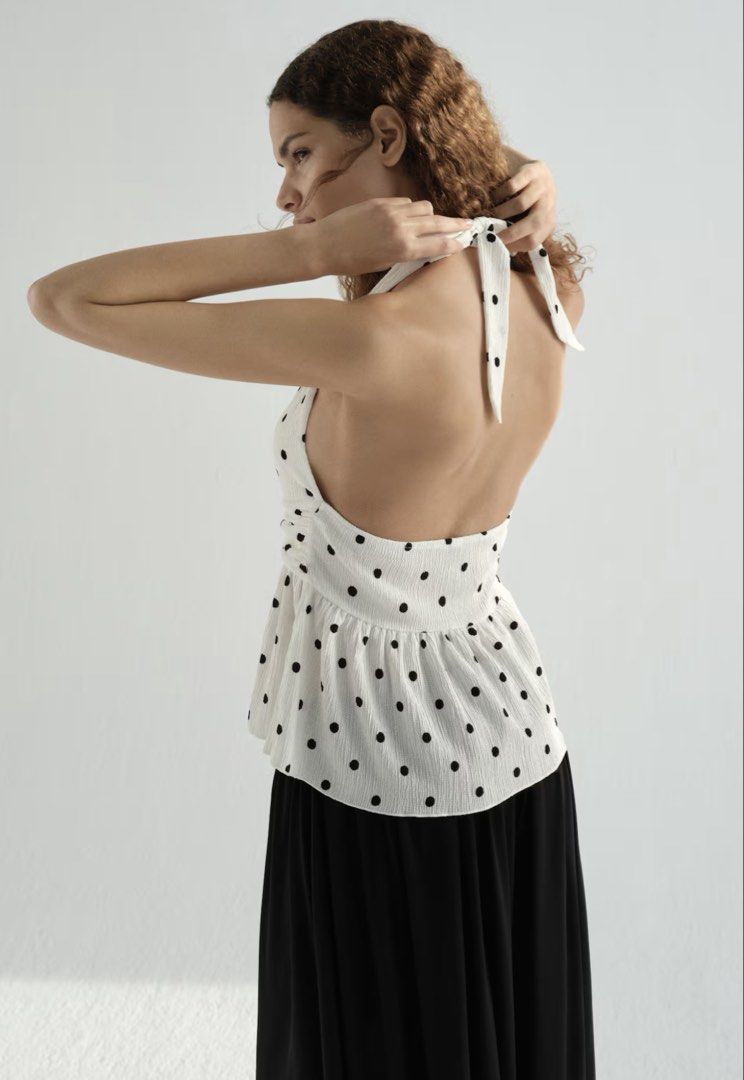 H&M POLKA DOTS HALTER PEPLUM TOP (Category: Sleeveless) located in Makati City. Submitted by sassywear.ph (Listing ID 1461187506, Image 3). Description: Used for a few hours lang, see last photo for actual ww. Good as new condition. Authentic h&m, bought it for 799. Super nice ww. :) price is a bit nego, just dm me. .
