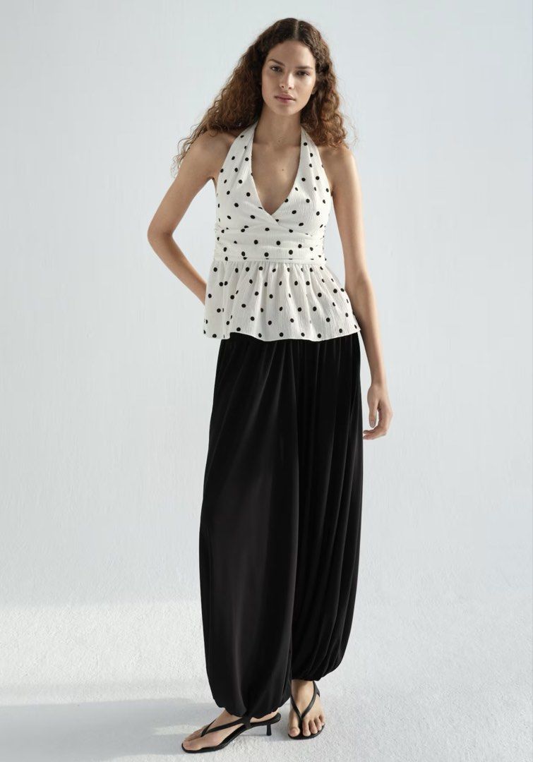 H&M POLKA DOTS HALTER PEPLUM TOP (Category: Sleeveless) located in Makati City. Submitted by sassywear.ph (Listing ID 1461187506, Image 2). Description: Used for a few hours lang, see last photo for actual ww. Good as new condition. Authentic h&m, bought it for 799. Super nice ww. :) price is a bit nego, just dm me. .