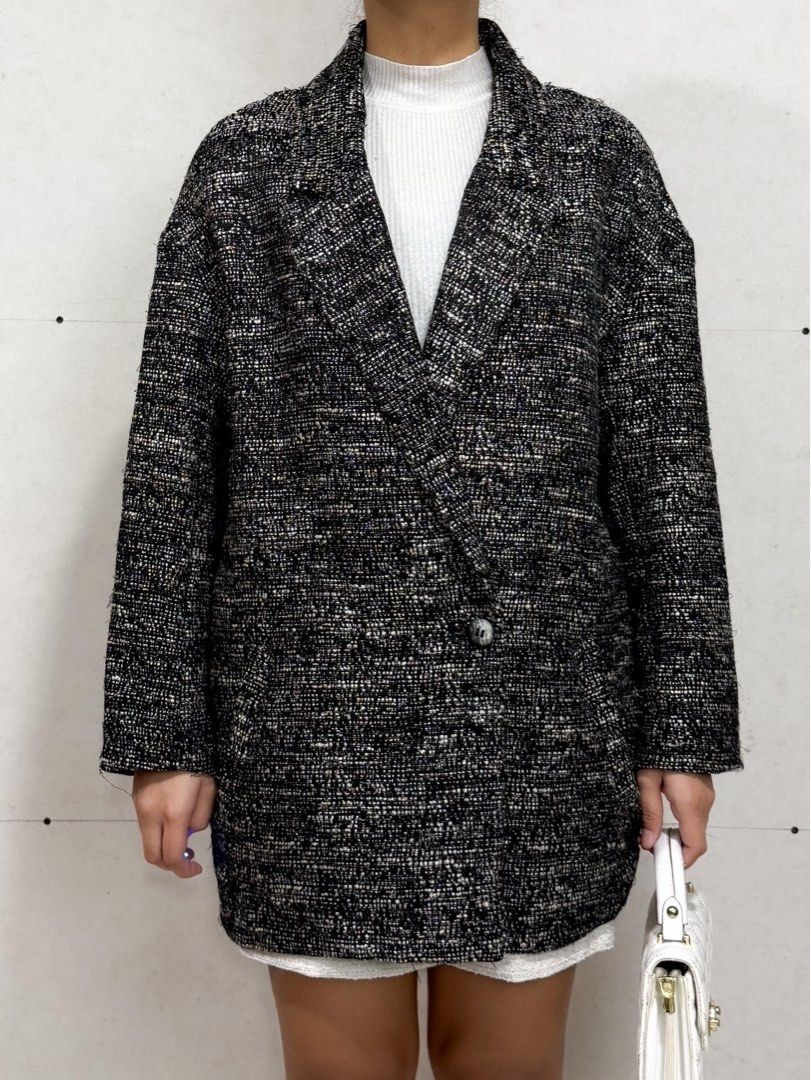 H&M Tweed Double-Breasted Jacket (Category: Coats, Jackets and Outerwear) located in Cabanatuan. Submitted by alysanne0910 (Listing ID 1461123039, Image 1). Description: Size: best fits Large Can do shipping nationwide. Courier: J&T. Shipping fee to be shouldered by buyer. - H&M Black & White Tweed Jacket - Double-breasted with 2 buttons - Versatile for smart casual looks - Pairs well with a white top.