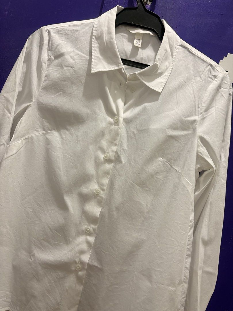 H&M White Button-Up Shirt (Category: Shirts) located in Manila. Submitted by t_a_s_h (Listing ID 1461219428, Image 1). Description: - Used once only! - Can fit waistline 27in below.