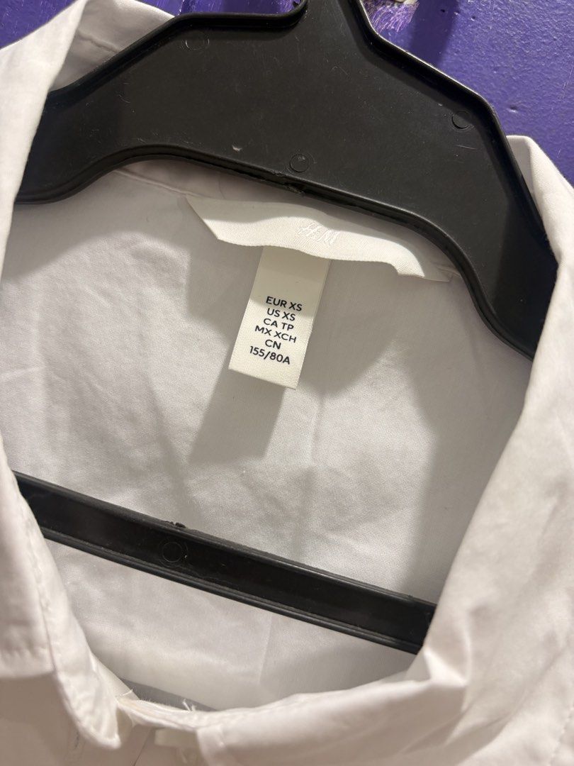 H&M White Button-Up Shirt (Category: Shirts) located in Manila. Submitted by t_a_s_h (Listing ID 1461219428, Image 2). Description: - Used once only! - Can fit waistline 27in below.