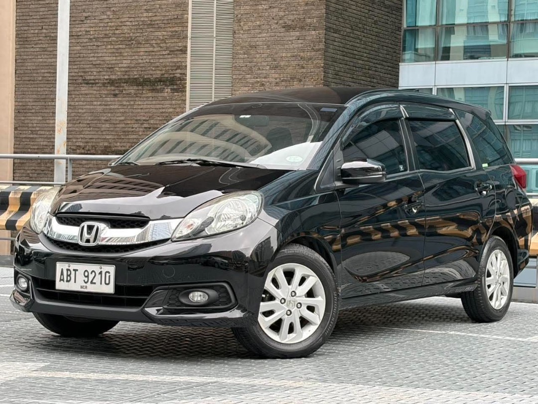 Honda Mobilio 1.5 V Auto (Category: Used Cars) located in Makati City. Submitted by allcarsbymissjun (Listing ID 1461132348, Image 2). Description: 2015 Honda Mobilio 1.5 V Automatic Gas Php 398,000 only!!! Cash, financing & trade-in Cash-out: 62K All In! 4yrs - 12,765 3yrs - 15,394 2yrs - 21,306 *Subject for approval* 1st owned 85K mileage Casa Maintained (with Casa Record) New Battery New Tire set of 4 Dash Cam Reverse Camera 1.5 Gas Automatic 