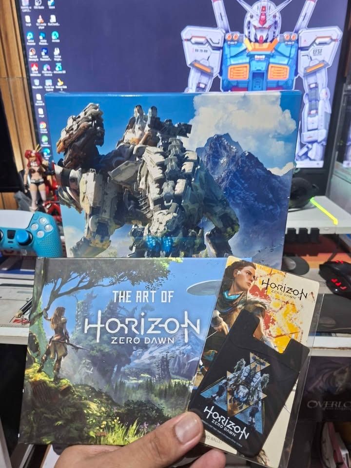 Horizon Zero Dawn Collector's Edition (Category: Figurines & Statues) located in Imus. Submitted by ToyBlazePH (Listing ID 1461283448, Image 2). Description: - Detailed Aloy statue from Horizon Zero Dawn - Features Aloy with her iconic bow - Includes a menacing machine figure - Comes with 'The Art of Horizon Zero Dawn' art book - Also includes collectible cards - A must-have for any fan of the game!.
