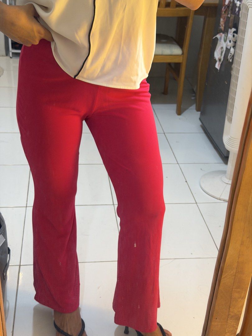 Hot Pink Flare Leggings Pants (Category: Other Bottoms) located in Mandaluyong City. Submitted by chocofudge__ (Listing ID 1461152043, Image 3). Description: - Vibrant hot pink flare leggings - Made with comfortable and stretchy material - Versatile for casual wear or dressing up - Flattering flare silhouette - Easy to pair with various tops - Note: Small mark on leg (see last photo).