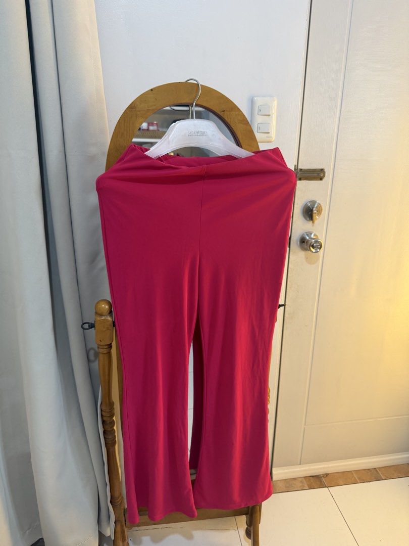 Hot Pink Flare Leggings Pants (Category: Other Bottoms) located in Mandaluyong City. Submitted by chocofudge__ (Listing ID 1461152043, Image 1). Description: - Vibrant hot pink flare leggings - Made with comfortable and stretchy material - Versatile for casual wear or dressing up - Flattering flare silhouette - Easy to pair with various tops - Note: Small mark on leg (see last photo).