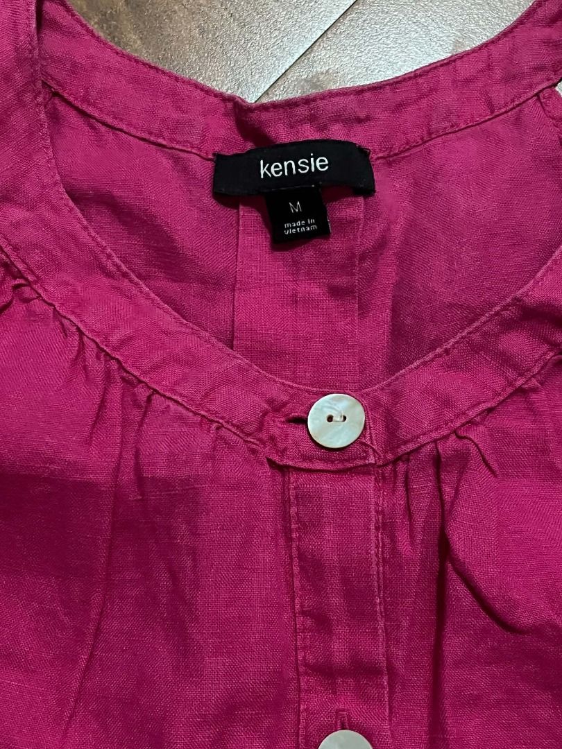 Hot Pink Halter Neck Button Up Top#74 (Category: Sleeveless) located in Caloocan City. Submitted by outfitloop (Listing ID 1461121445, Image 3). Description: - Button up detail at the front - Sleeveless design - Lightweight and comfortable fabric IMPORTANT: • 1st photo is an AI styling/model preview for reference on how the item may look when worn. • Please refer to the actual photos for the item’s true appearance and condition. • Color may sligh
