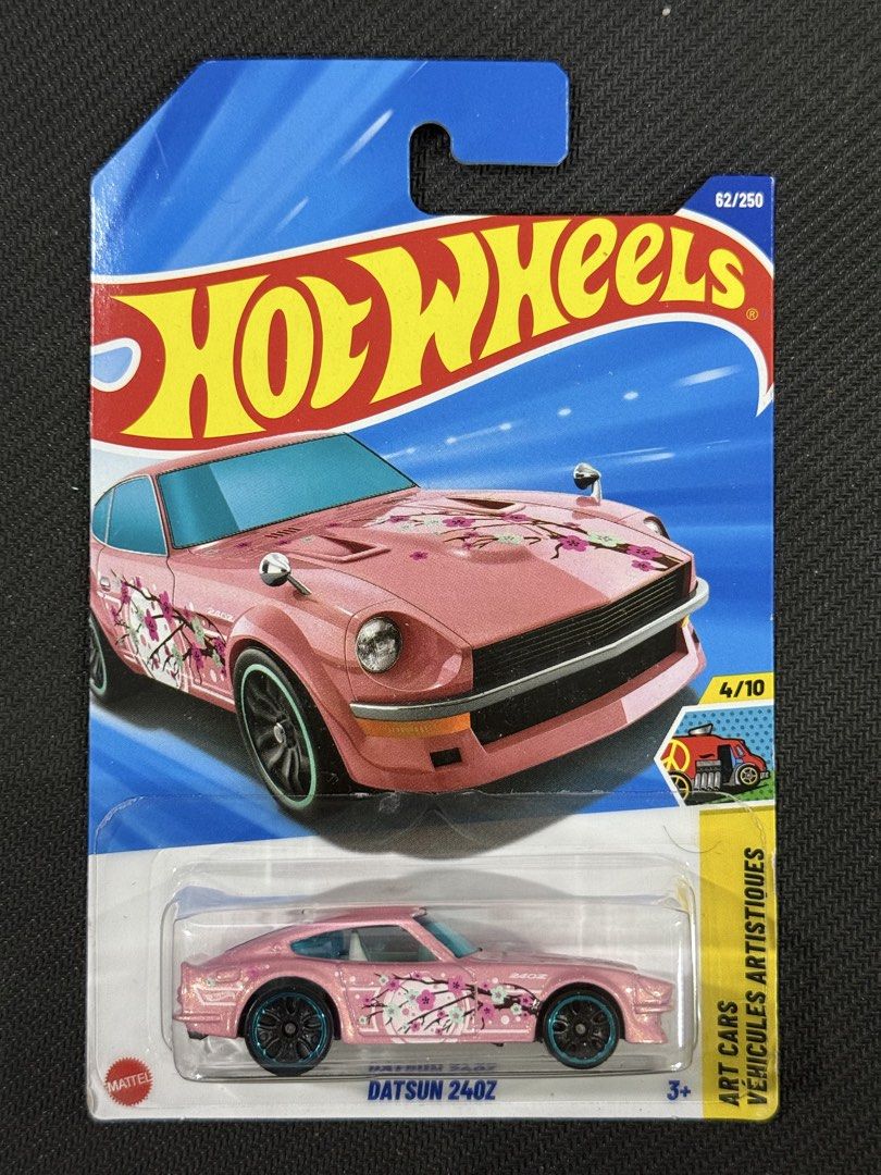 Hot Wheels Datsun 240Z (Category: Vehicle & Diecast Models) located in Muntinlupa City. Submitted by eman_garcia_ (Listing ID 1461319116, Image 1). Description: - Pink Hot Wheels Datsun 240Z - Features unique cherry blossom art car design - Part of the exclusive Art Cars series - Model number: 62/250 - Perfect for Hot Wheels collectors or for play!.